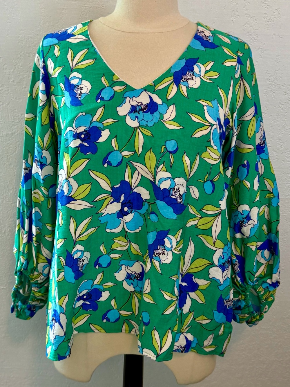 Vine & Love Green Floral V-Neck Blouse with Blue and White Flowers